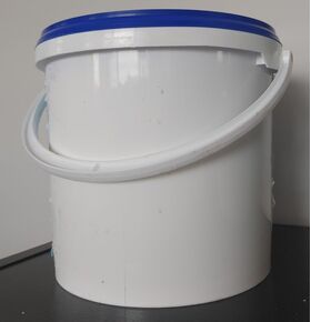 plastic bucket with roll of wipers